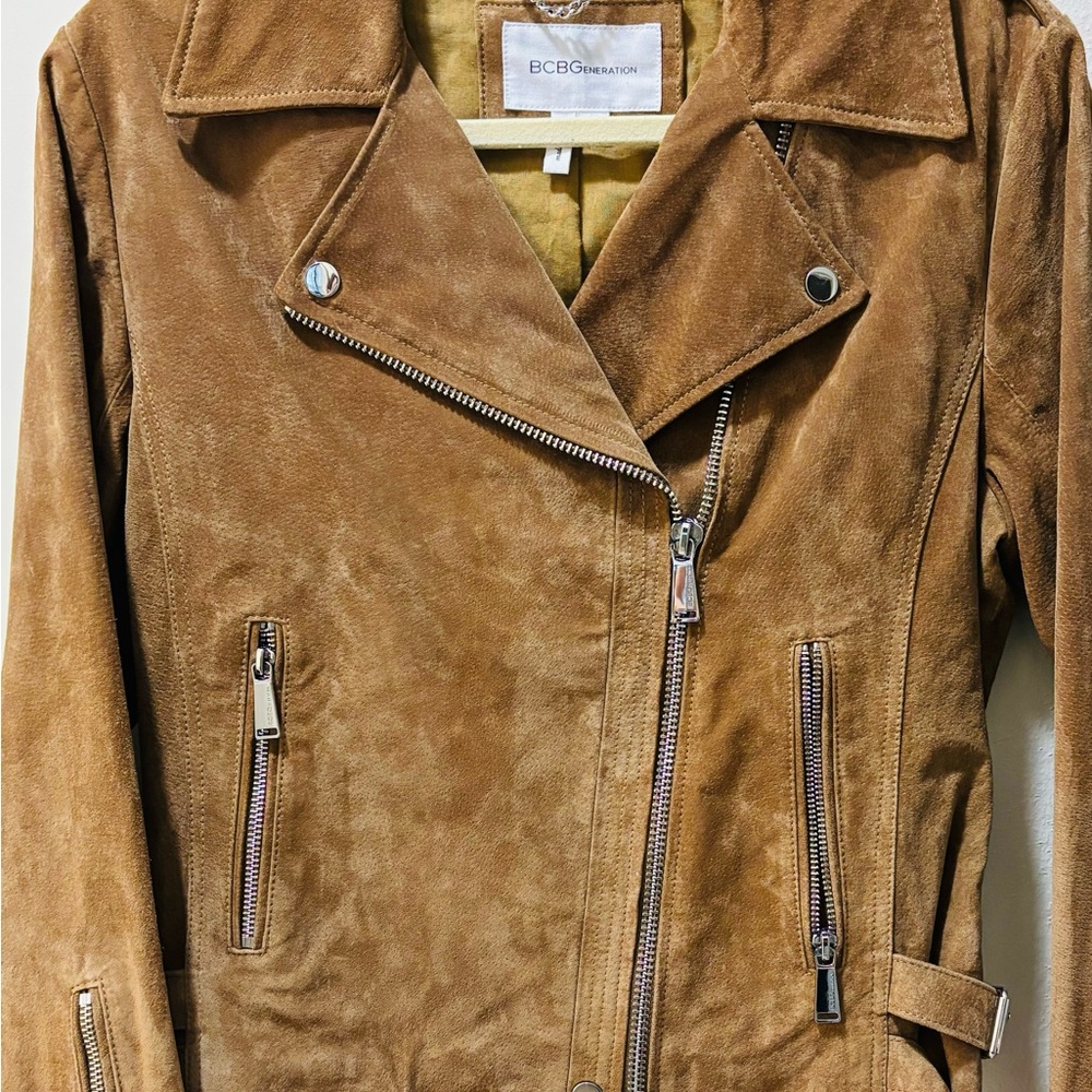 Beautiful Suede BCBG jacket. Size M. Like New. Full zip front w/snap closure.